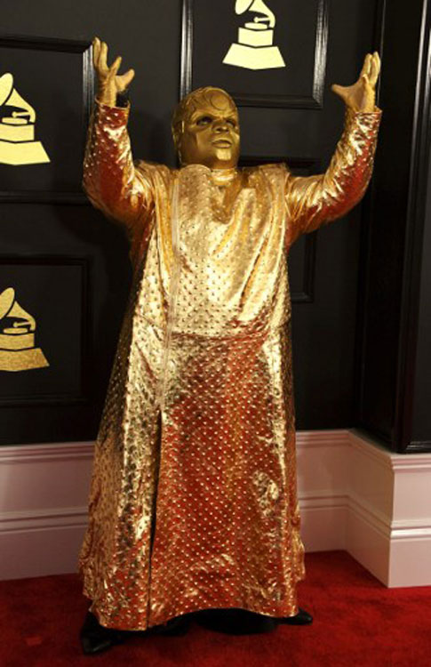 CeeLo glows in gold (photo c/o AFP)